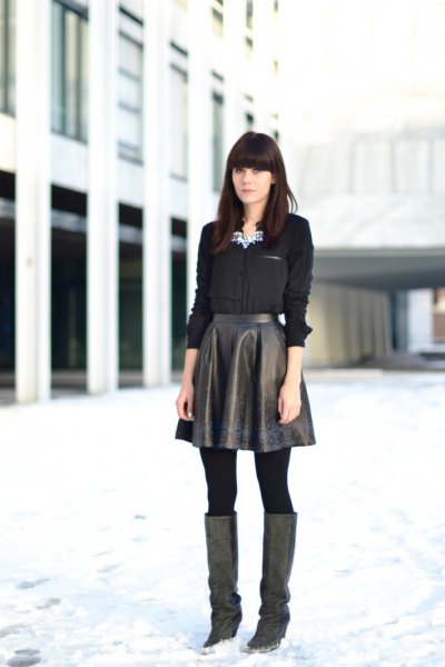 black shirt with buttons and flared leather petticoat