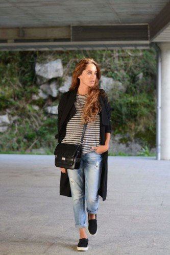 black longline coat with striped long-sleeved T-shirt and boyfriend jeans