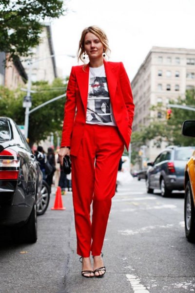 white graphic t-shirt with red suit jacket and matching trousers