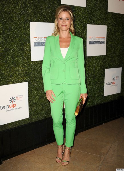 light green suit with a white t-shirt with a scoop neck and silver heels