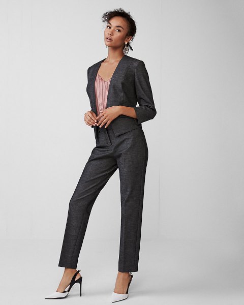 Slim fit suit with a striped top with a V-neck and white heels
