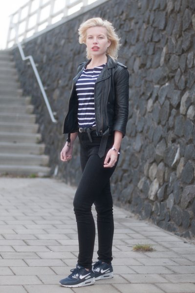 striped t-shirt with black leather jacket and dark blue sneakers