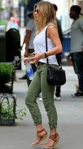 white tank top with army green trousers with cuffs and wedge sandals
