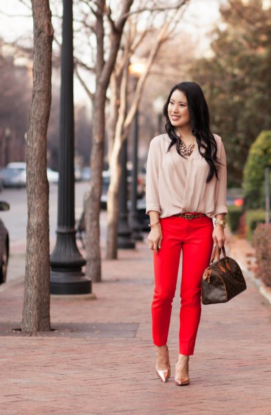light pink blouse with red, cropped trousers and rose gold heels