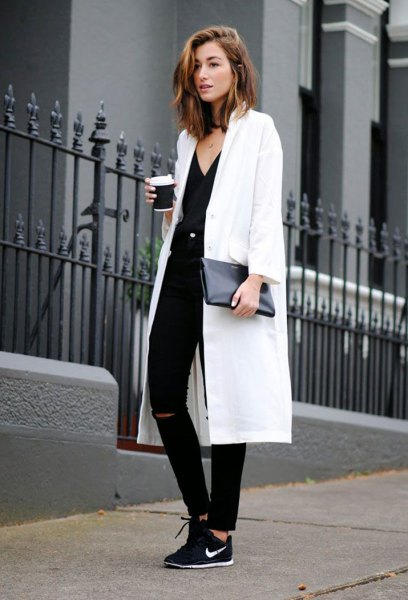 white maxi blazer with v-neck and black hiking shoes
