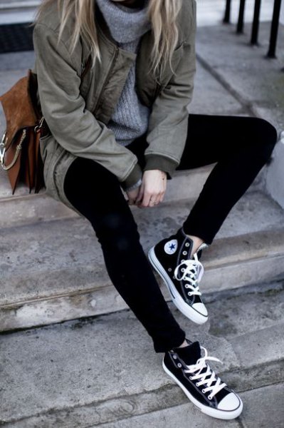 gray parka jacket with turtleneck sweater and black and white canvas shoes