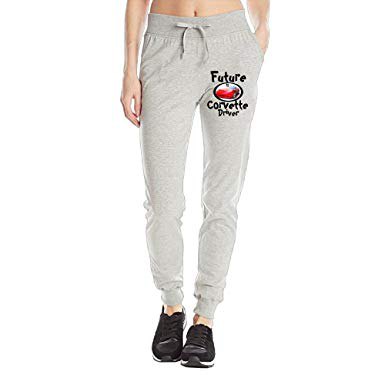 gray graphic fleece pants with black and white sneakers