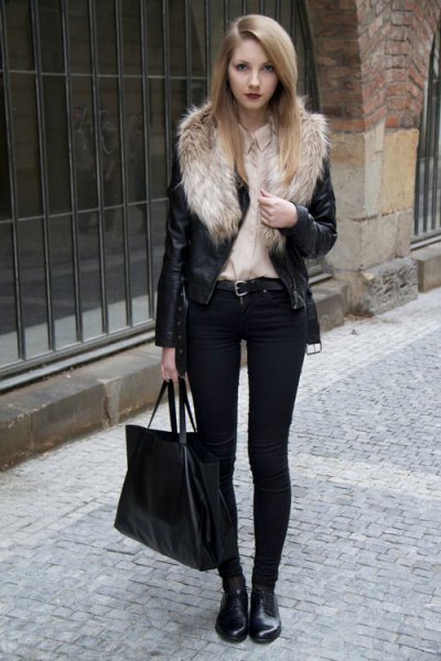 Biker jacket with faux fur collar and black skinny jeans