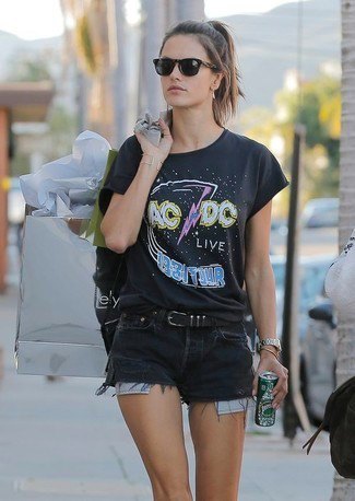 Graphic t-shirt with black denim shorts with a belt