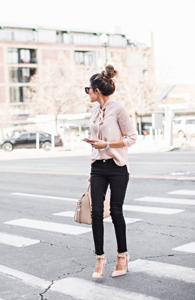 Light pink blouse with black jeans and pointed toe heels