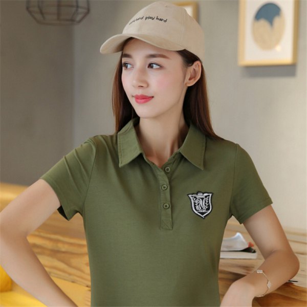green slim fit embroidered polo shirt with light pink baseball cap
