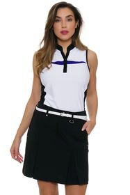sleeveless polo shirt with white and black graphics and mini skirt