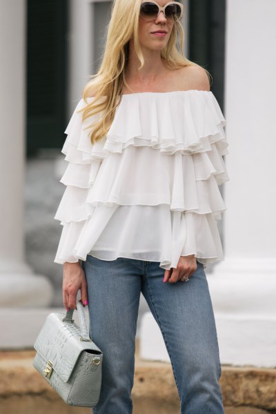 strapless multilayer ruffle chiffon blouse with blue jeans