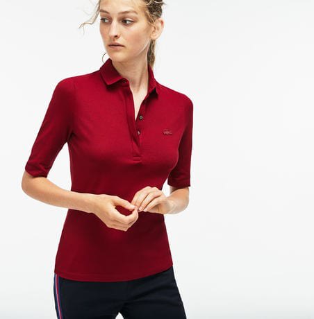 burgundy-colored polo shirt with half sleeves and black nylon running pants