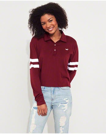 burgundy colored polo shirt with a relaxed fit and light blue boyfriend jeans