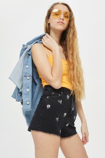 yellow tank top with cute black denim shorts and denim jacket