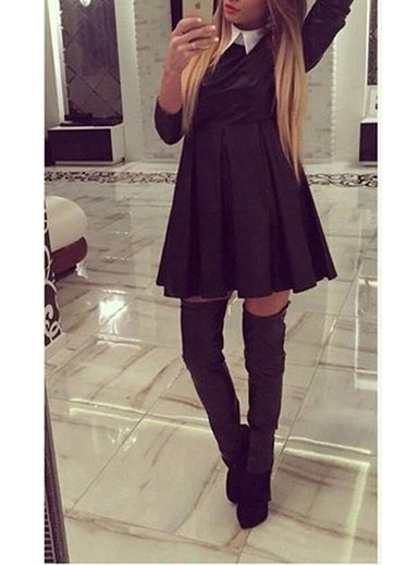 black pleated swing dress with gray over the knee boots
