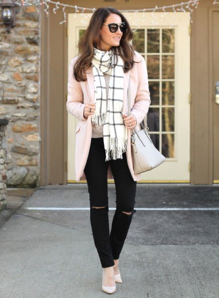 Light pink cardigan with white and black checkered fringed scarf