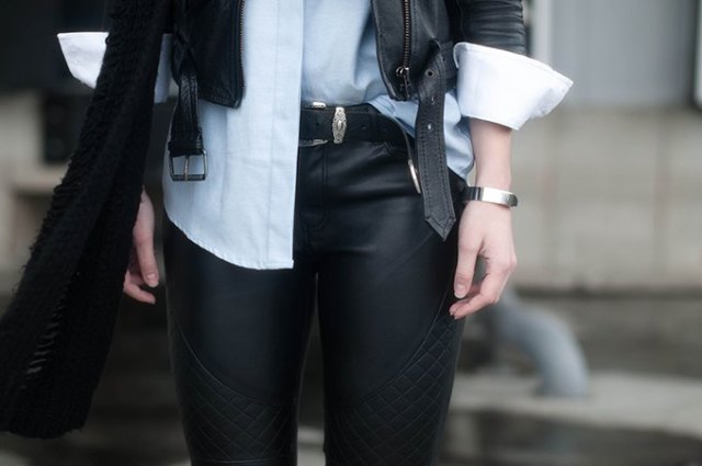 black leather jacket with white shirt and biker pants with belt