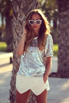 silver sequin top with short sleeves and light yellow mini skort