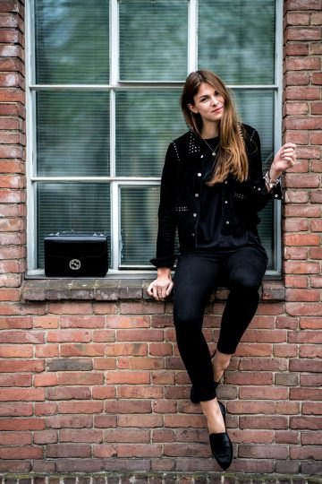 black biker jacket with rivets, skinny jeans and leather low shoes