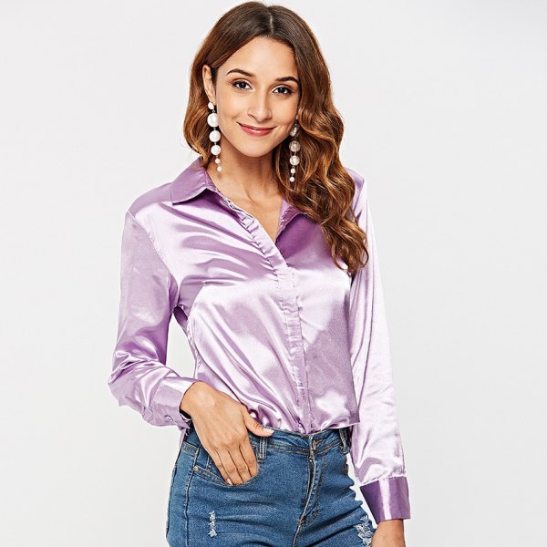 shiny light blue silk shirt with buttons and blue mom jeans