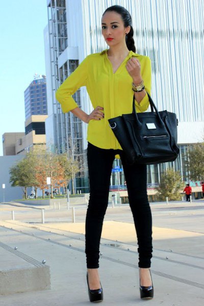 long-sleeved yellow shirt with buttons and black skinny jeans