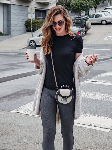 light gray longline cardigan with black t-shirt and knitted pants