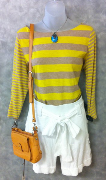 yellow-gray striped long-sleeved T-shirt with white mini shorts with a tie front