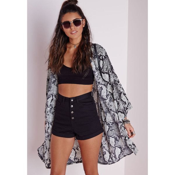 Crop top with black skyscraper shorts with a button placket and printed kimono cardigan