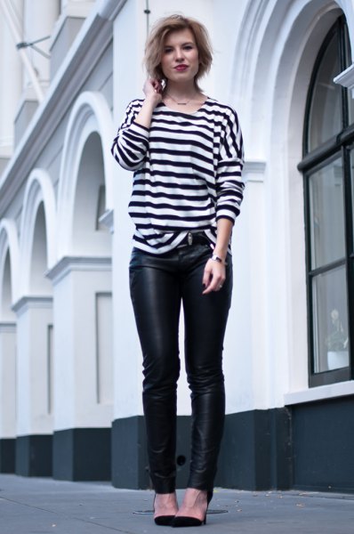 black and white striped long-sleeved T-shirt with leather leggings