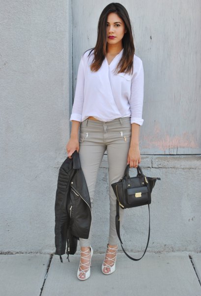 white blouse with gray skinny jeans and strappy heels