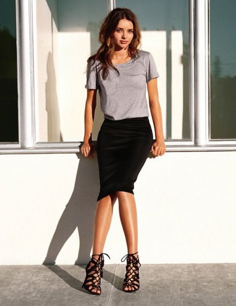 gray t-shirt with black midi skirt and strappy lace-up shoes