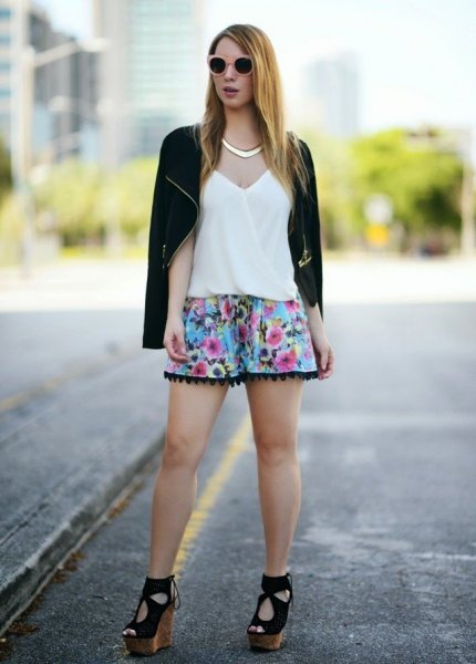 black casual blazer with light blue mini shorts with floral pattern