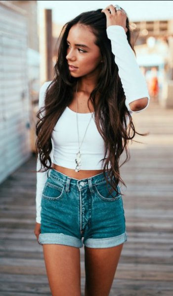 white short t-shirt with short sleeves and gray denim shorts with cuffs