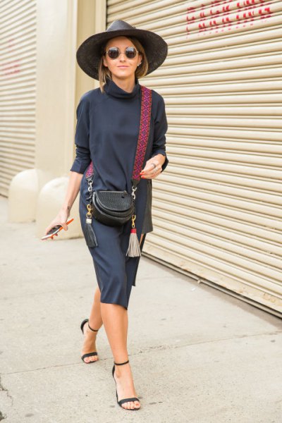 blue sweater dress with stand-up collar and dark blue sandals