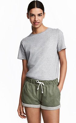gray t-shirt with a relaxed fit and matching mini shorts made of cotton