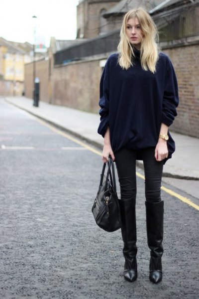 black velvet coat with matching skinny jeans and knee-high boots