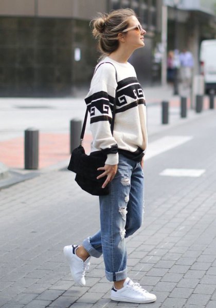white and black tribal printed chunky sweater with cuffed jeans with cuff