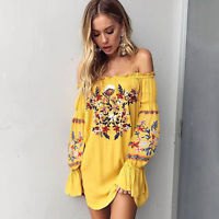 Mustard-yellow shirt dress with a floral print