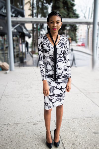 Black and white long sleeve wrap dress with floral pattern and tie