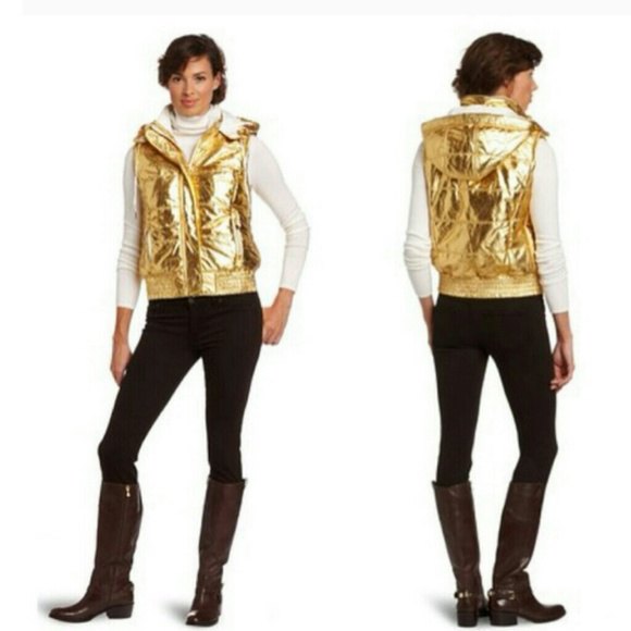 shiny gold hooded vest with white mock-neck long-sleeved T-shirt