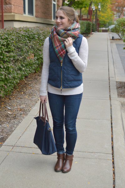 Puffer vest with gray cashmere scarf and short gray leather boots