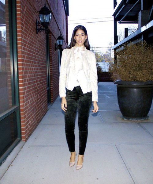 white blazer with black slim fit trousers and pointed toe heels