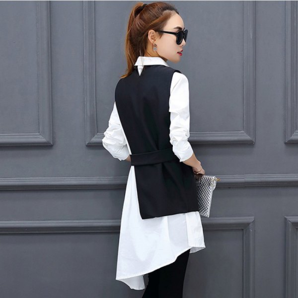 black suit vest with white tunic shirt dress and jeans
