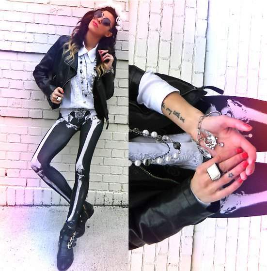 black leather bomber jacket with white collar shirt and skeleton gaiters