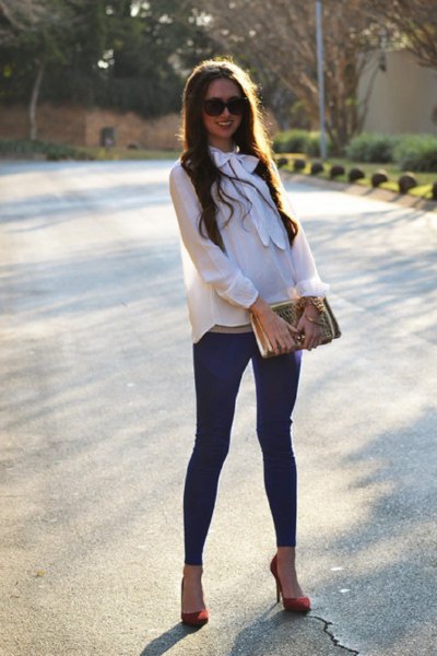 white chiffon blouse with dark blue leggings and burgundy heels