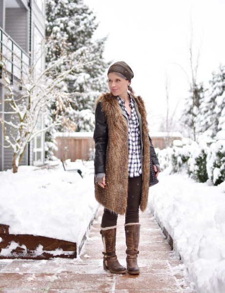 brown faux fur longline vest with black fleece leggings and checkered shirt