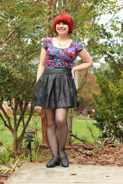 matching pink t-shirt with floral pattern and pleated mini skirt