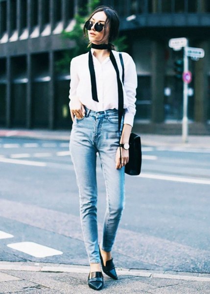 white shirt with buttons, slim fit jeans and black leather loafers with pointed toes